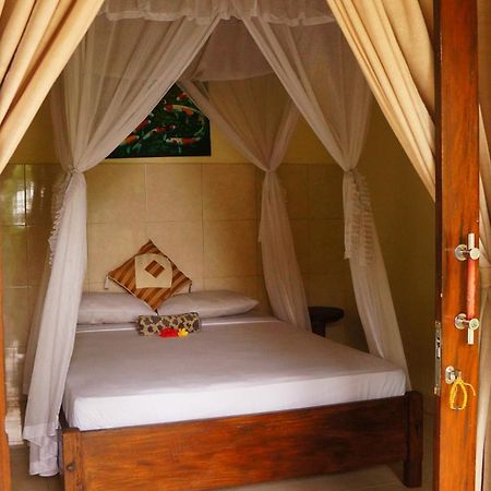 Rumahku Homestay Амед Экстерьер фото