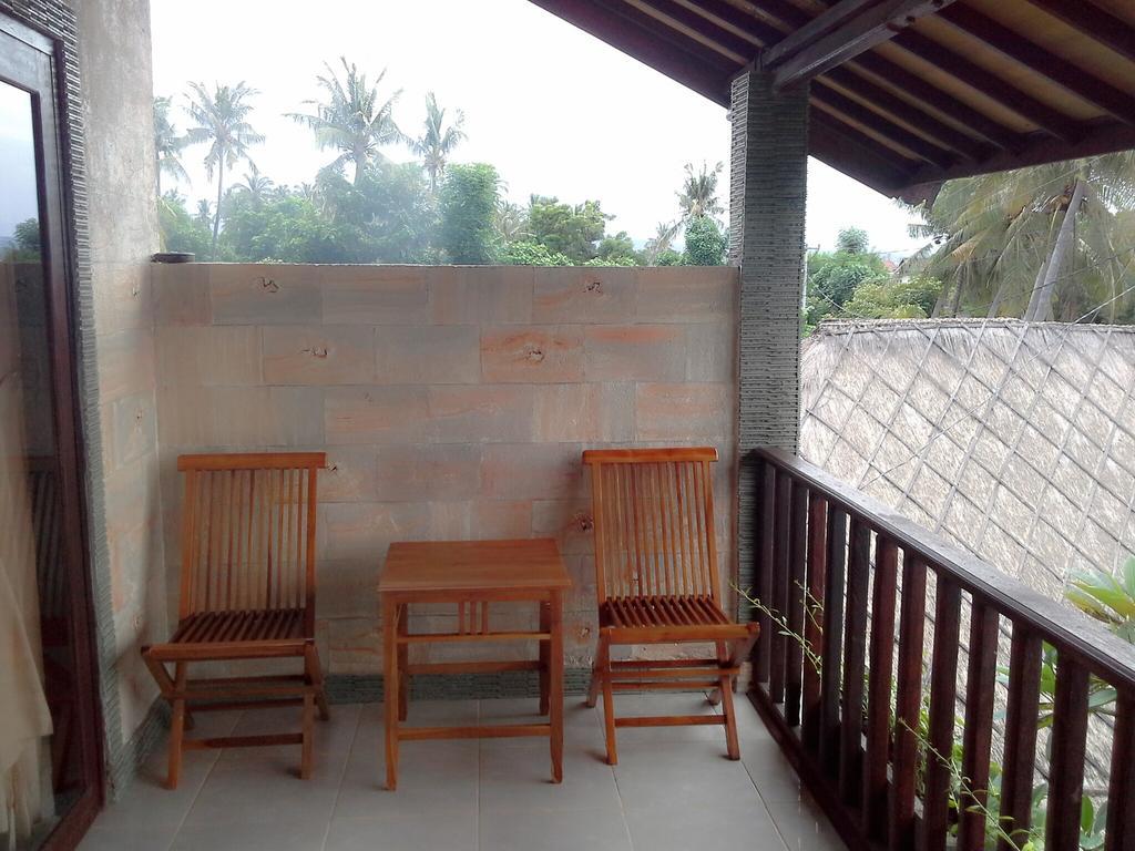 Rumahku Homestay Амед Номер фото
