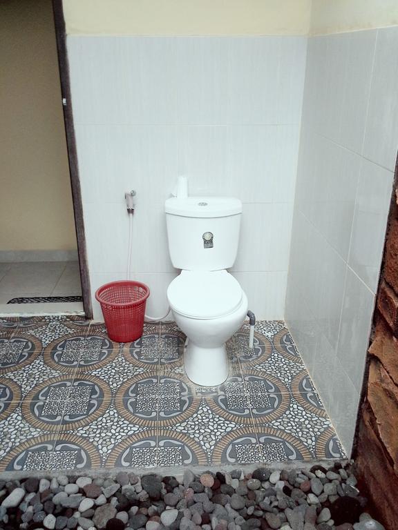Rumahku Homestay Амед Номер фото