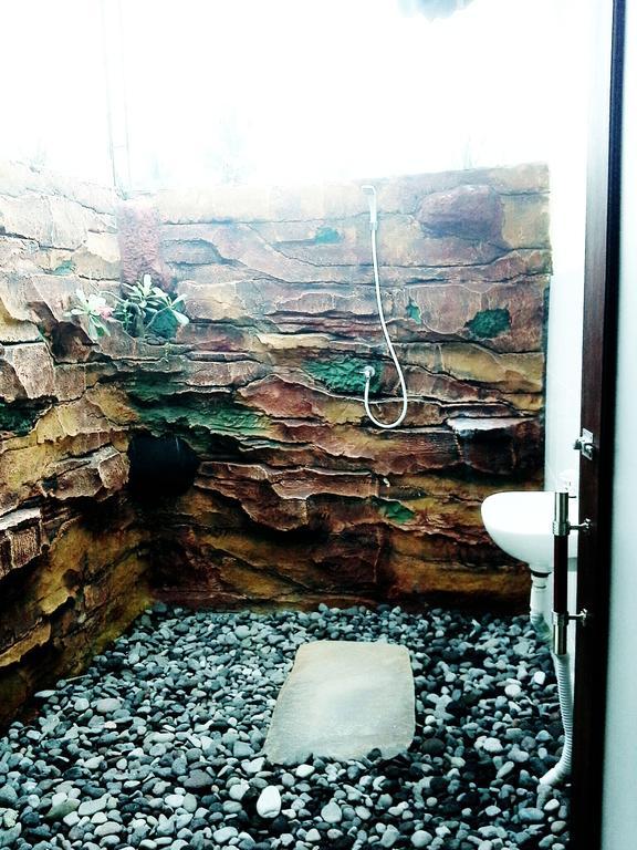 Rumahku Homestay Амед Номер фото