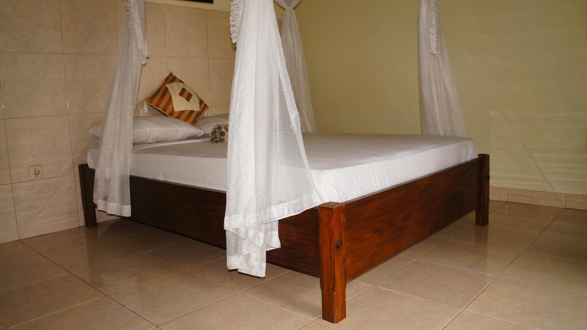 Rumahku Homestay Амед Экстерьер фото