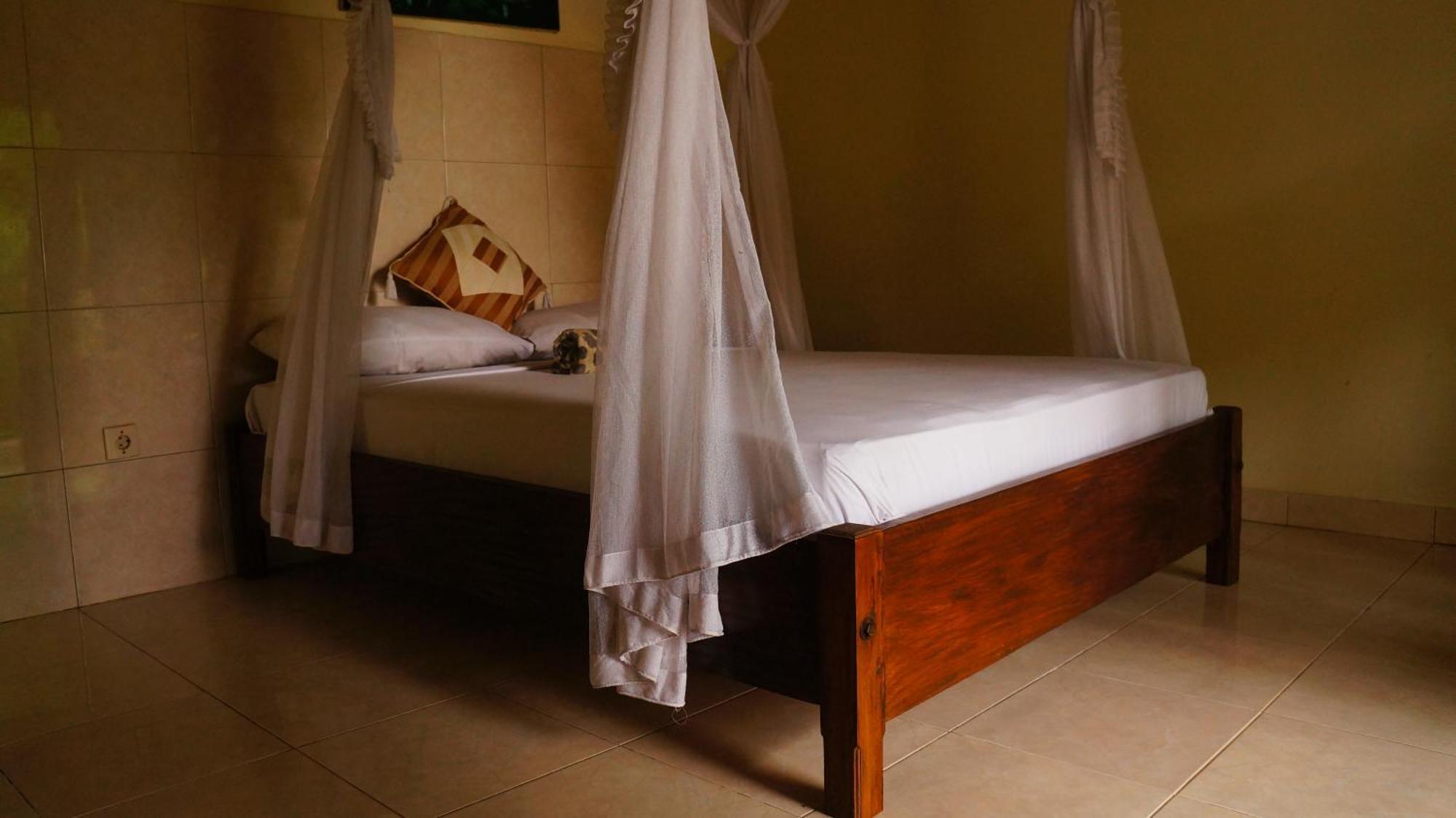 Rumahku Homestay Амед Экстерьер фото