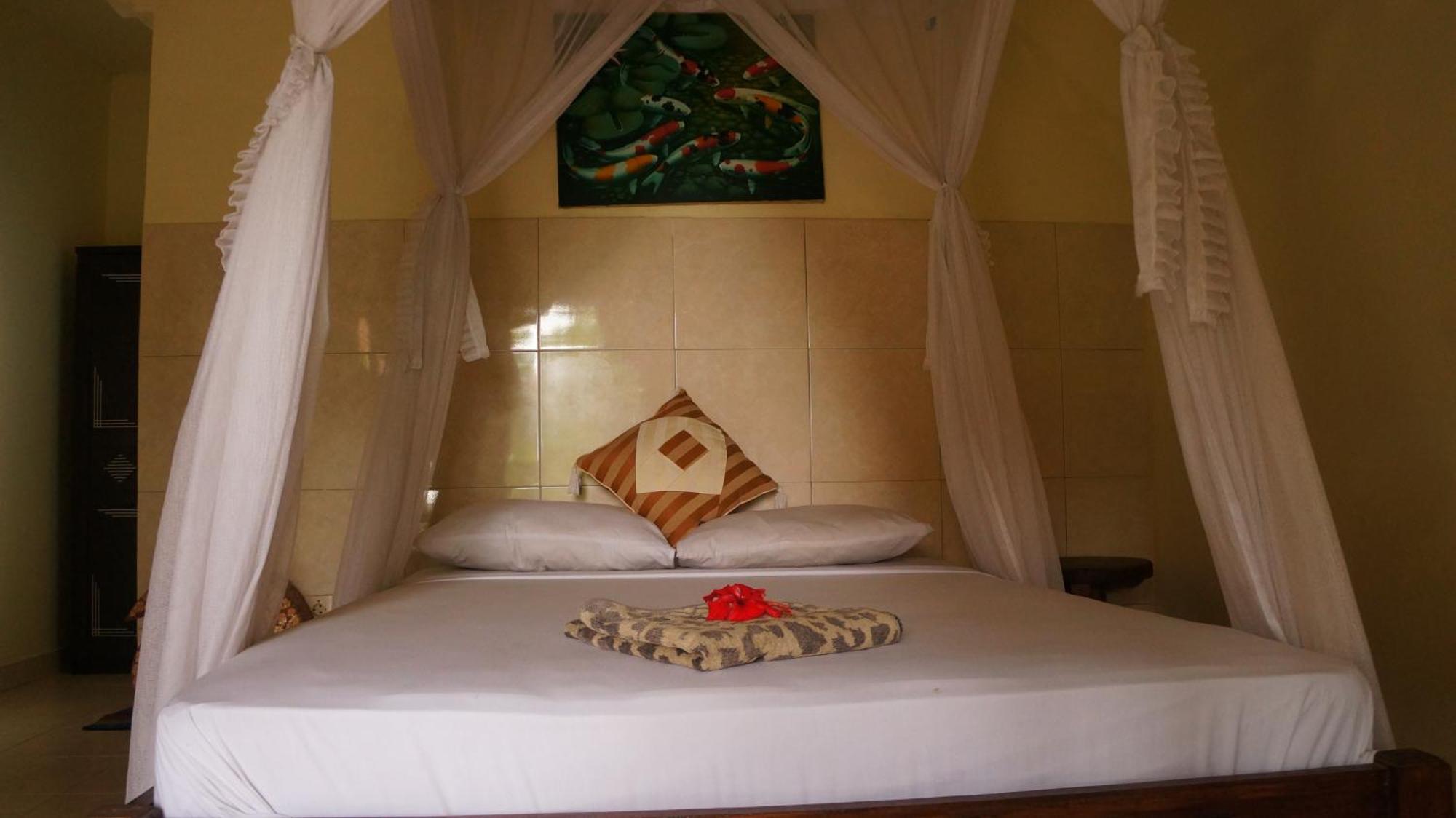 Rumahku Homestay Амед Экстерьер фото