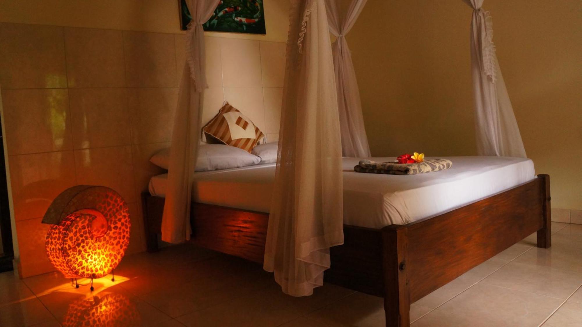 Rumahku Homestay Амед Экстерьер фото