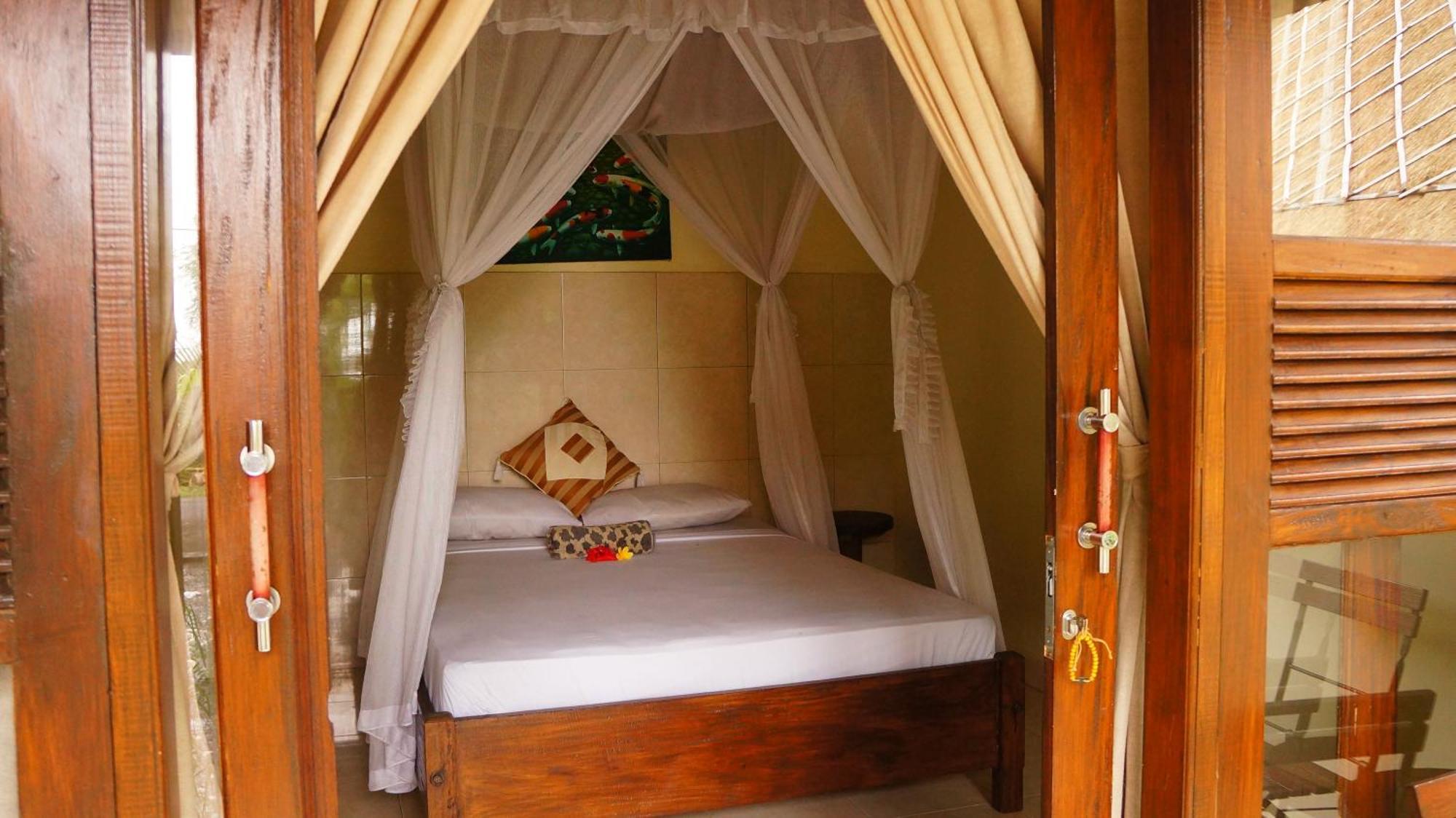 Rumahku Homestay Амед Экстерьер фото