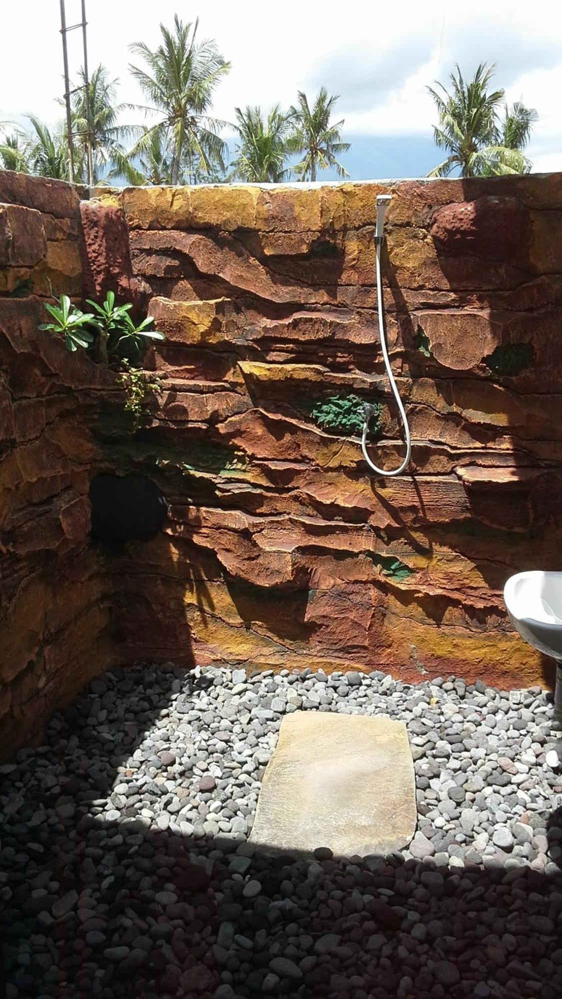 Rumahku Homestay Амед Номер фото