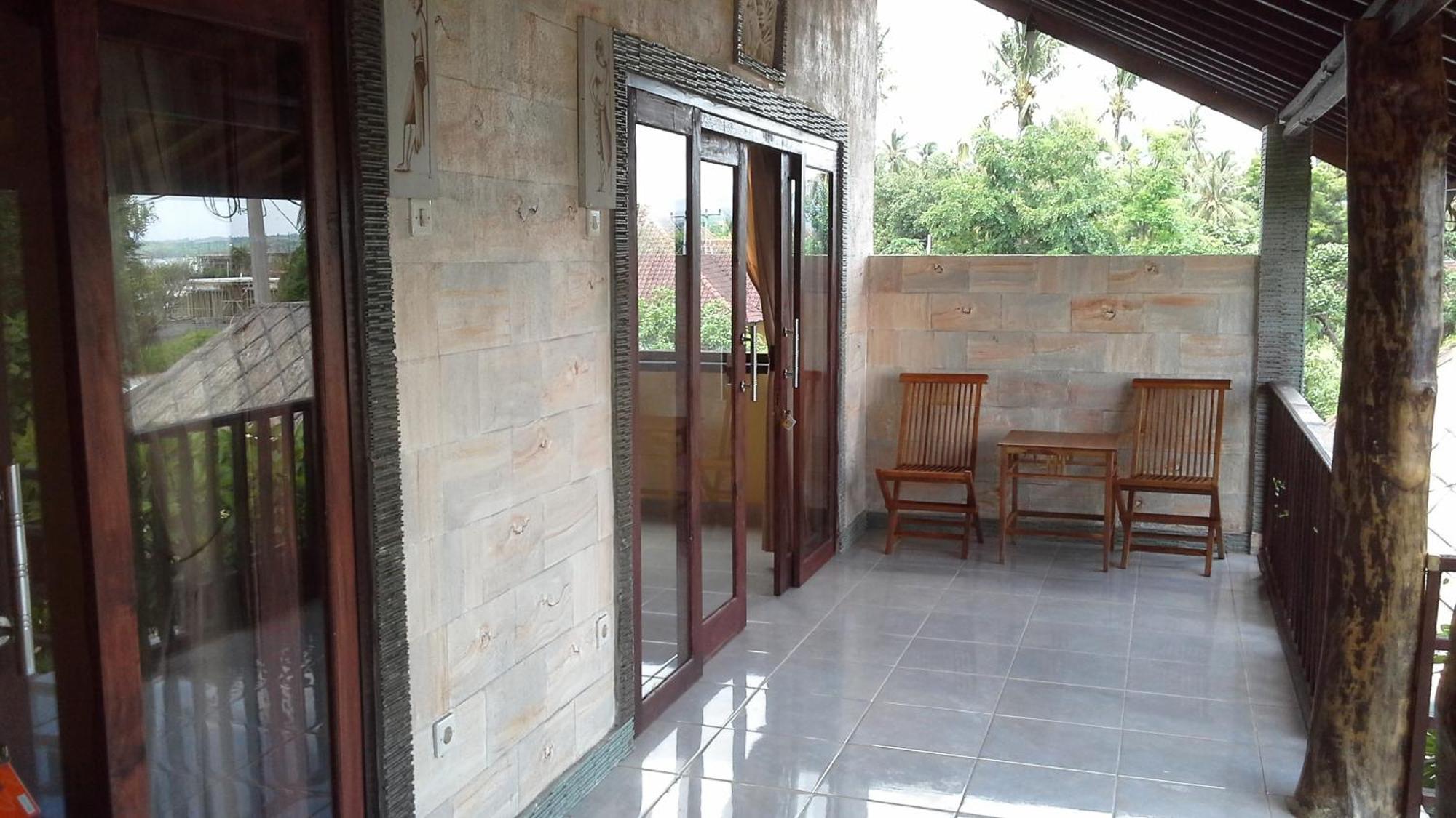 Rumahku Homestay Амед Номер фото